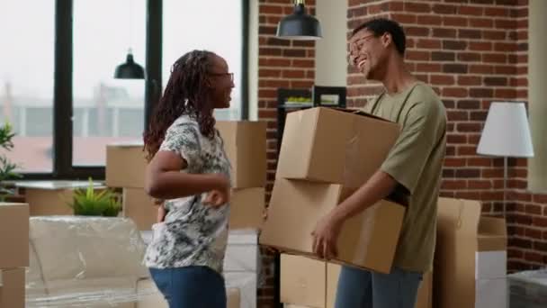 Married couple feeling excited about having keys of new apartment flat, buying first house together and moving in. Celebrating relocation and being property homeowners for new beginnings. - Filmmaterial, Video