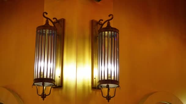 Tilt down lighting old lamp at wall in chinese Temple. - Materiał filmowy, wideo