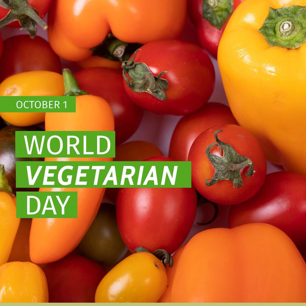 Composition of world vegetarian day text over tomatoes and peppers. World vegetarian day and celebration concept digitally generated image. - Foto, Imagem