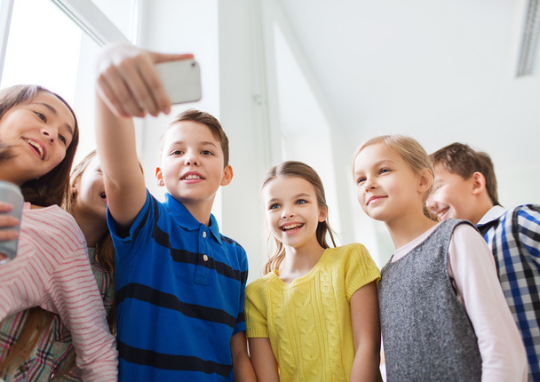 group of school kids taking selfie with smartphone - Fotoğraf, Görsel
