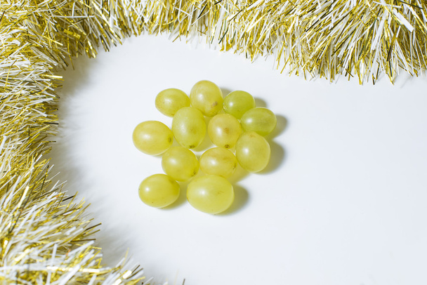 Twelve grapes, that are eaten in Spain to celebrate the new year - 写真・画像