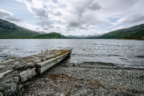 A boat pier on the Gjende lakeshore in Jotunheimen, Norway - Photo, image