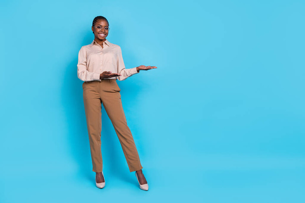 Full body photo of smart young business lady present new project start-up to colleagues isolated on blue color background. - Fotografie, Obrázek
