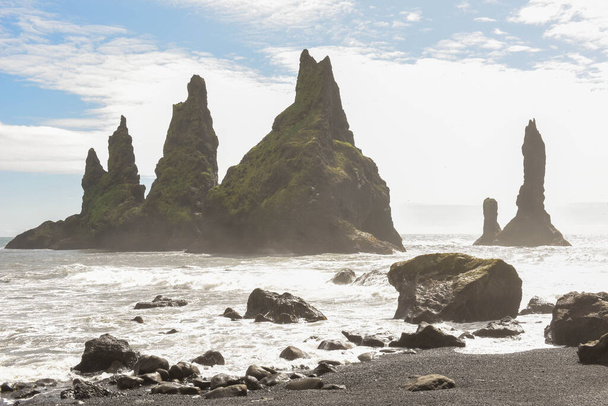 Sea stacks of Reynisfjara Beach near Vik on Iceland - 写真・画像