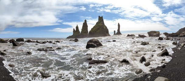 Sea stacks of Reynisfjara Beach near Vik on Iceland - Fotoğraf, Görsel