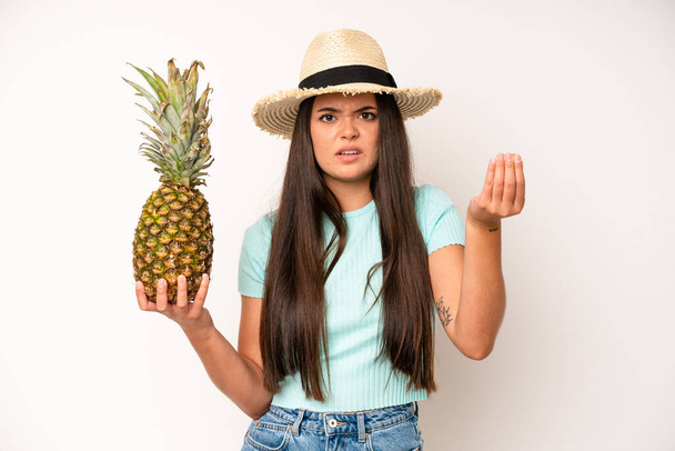 hispanic pretty woma feeling like a happy and excited genius after realizing an idea. pineapple and summer concept - Fotó, kép