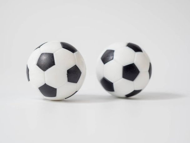 Soccer ball on a white background. Soccer ball close up. Small soccer plastic ball. - Fotoğraf, Görsel