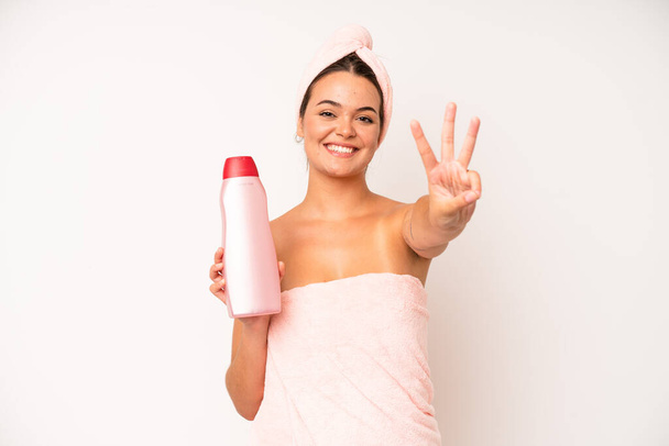 hispanic pretty woma screaming with hands up in the air. shower and hair product concept - Photo, image