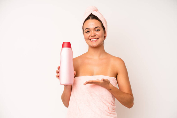 hispanic pretty woma feeling extremely shocked and surprised. shower and hair product concept - Valokuva, kuva