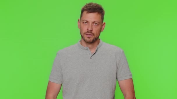 Stop. Young man say No hold palm folded crossed hands in stop gesture, warning of finish, prohibited access, declining communication, body language, danger. Adult guy isolated on chroma key background - Záběry, video