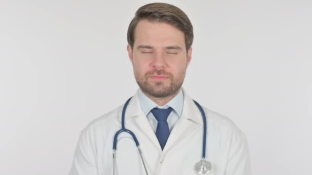 Serious Young Adult Doctor on White Background  - Кадры, видео
