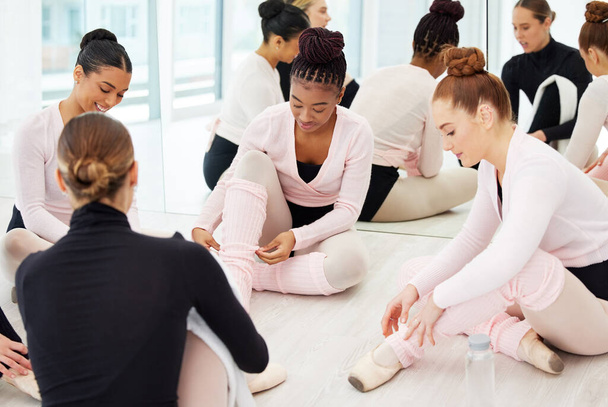 Getting ready with my girls. a group of young ballerinas preparing for their routine - 写真・画像