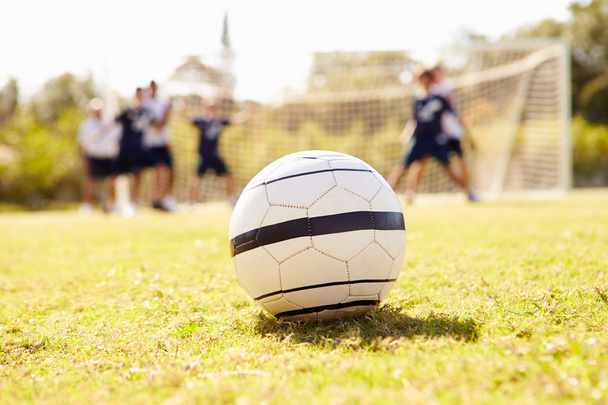 Soccer Ball With Players In Background - Zdjęcie, obraz