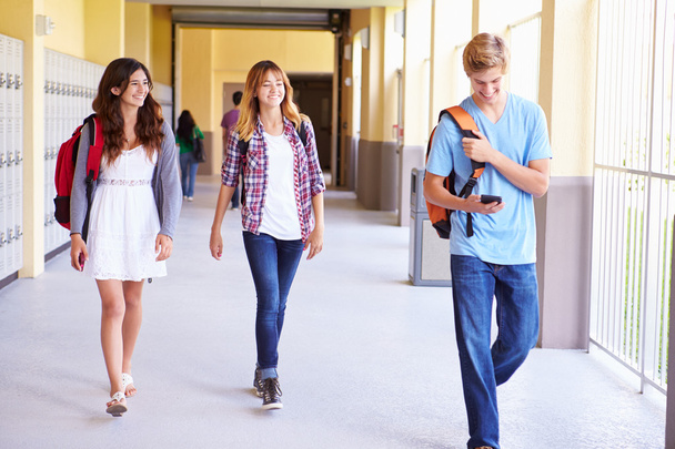 Students Walking In Hallway - Фото, зображення
