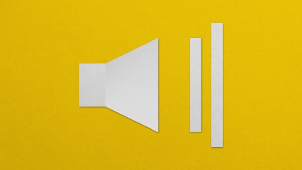 white paper speaker set on a yellow background. - Filmati, video