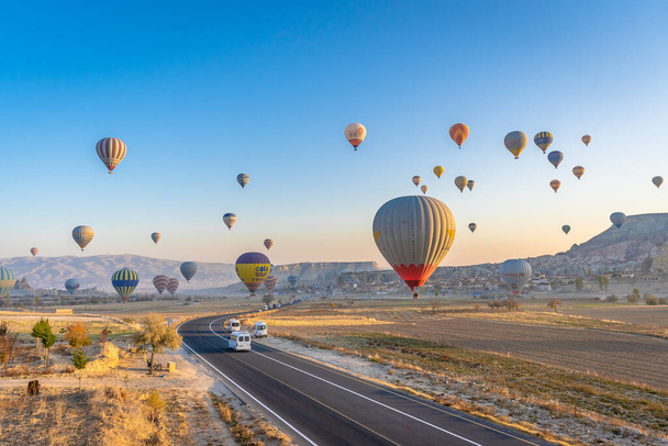 A closeup of hot air balloon ascent in Cappadocia, turkey - 写真・画像