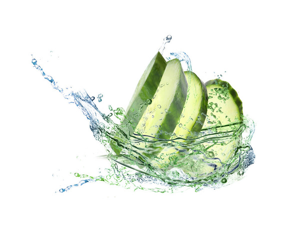 Slices of fresh cucumber and splashing water on white background - Zdjęcie, obraz
