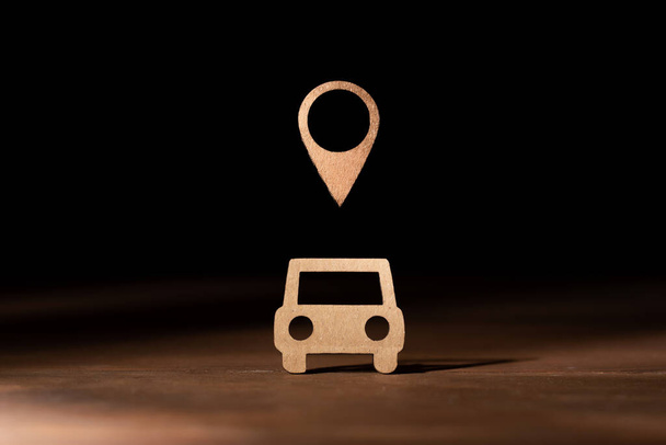 Cardboard representation of a car with the symbol of position on the map. Real time location and localization of vehicles - Fotó, kép