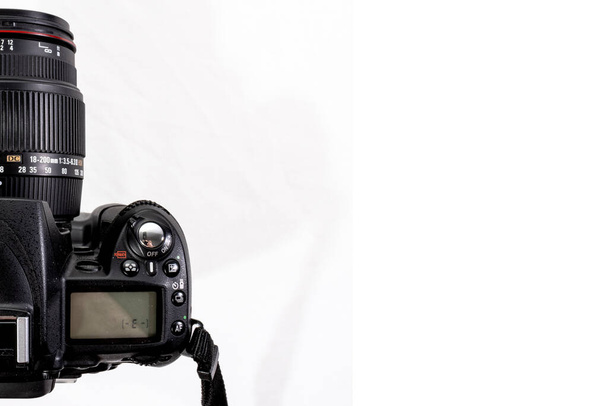 Professional digital camera, isolated on white background - Valokuva, kuva