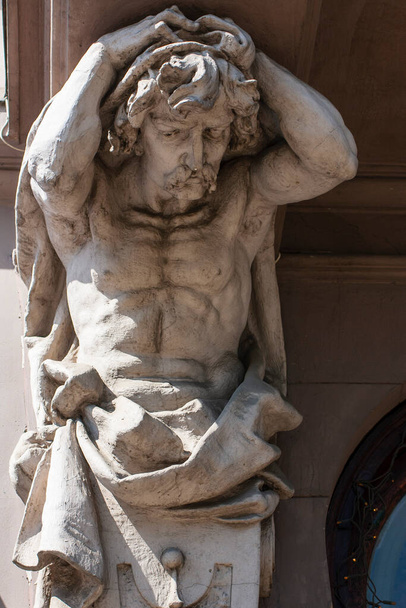 Stone corbel. Sculpture of a mustachioed man. Architecture element in Lviv, Ukraine. Eclecticism of the 19th century from the Austro-Hungarian Empire. Vienna Secession. - Foto, Imagem
