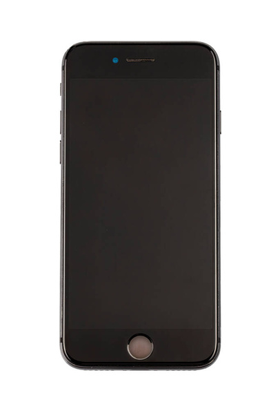 İstanbul Türkiye; 23 Temmuz 2022: Bir Apple iPhone 8 Plus aygıtı beyaz arka planda izole edildi. Gerçekçi, cep telefonu koleksiyonu. Kullanılmış telefon ekranında ve telefon kılıfında çizikler var.. - Fotoğraf, Görsel