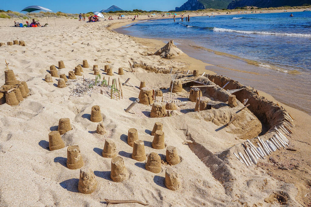 Beautiful handmade sand castle in Voidokoilia beach near Romanos area in Messenia, Peloponnese, Greece, Europe - Photo, Image