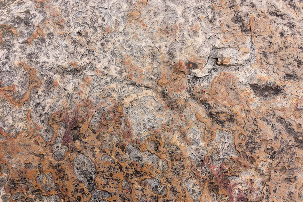 Tekstura kamieni na tle lub tle. ujęcie z bliska powierzchni skały  - Zdjęcie, obraz