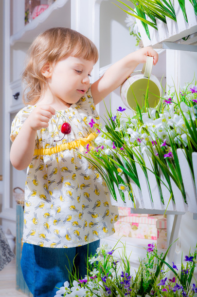 Girl watering flowers - Fotografie, Obrázek