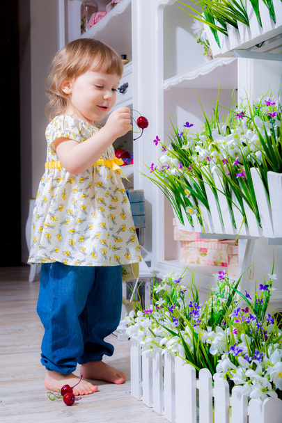Girl watering flowers - 写真・画像