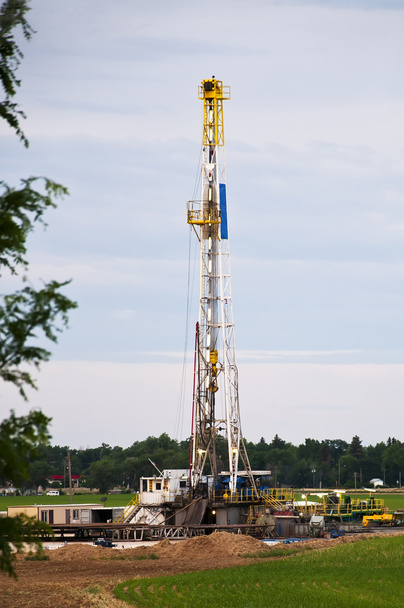 Oil rig in a cornfield - Photo, Image