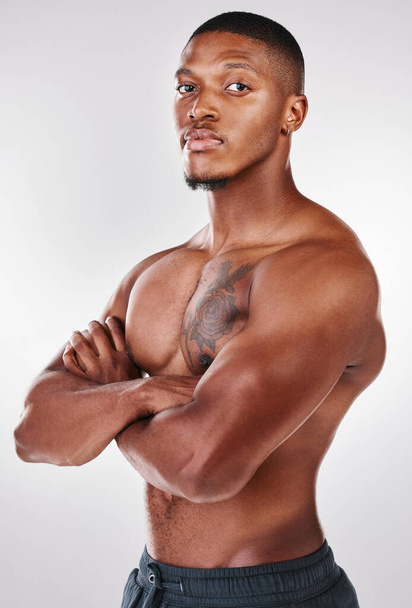 Feelings arent always logical, theyre always valid. Studio shot of a handsome shirtless young man posing against a white background - Foto, afbeelding