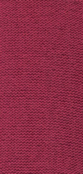 Purple coquelicot colored wool sweater texture. Woolen carnation fabric texture or abstract background. - Photo, Image