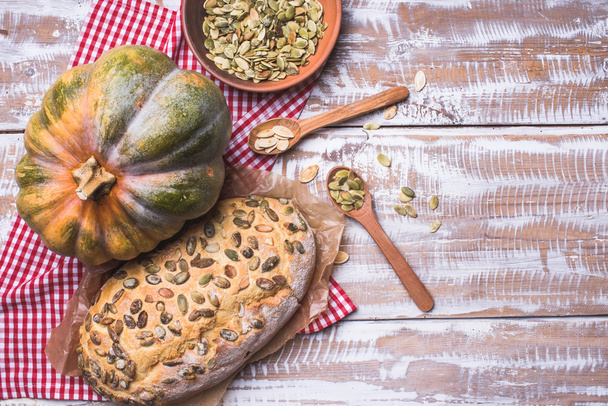 White bread with pumpkin seeds - Photo, image