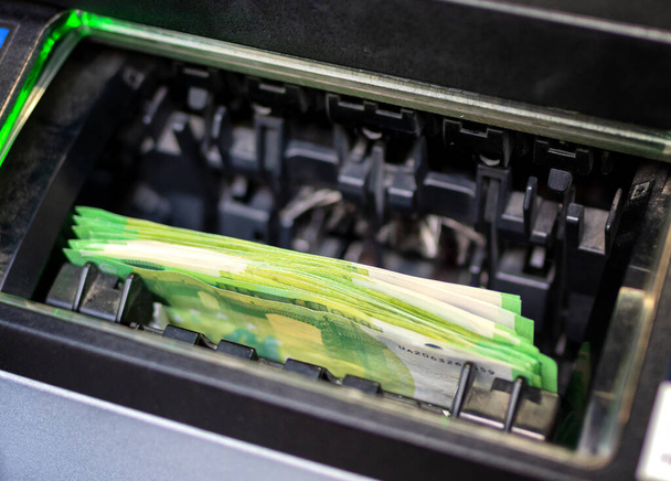 One hundred euros in cash machine - Foto, Imagem