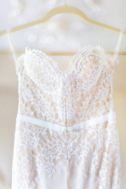 Beige wedding dress with lace. Details closeup. - Фото, зображення
