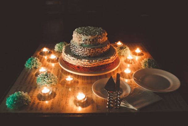 Multilevel wedding cake decorated with various patterns. - Valokuva, kuva