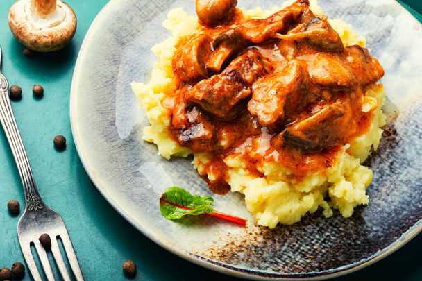 Taty beef stroganoff meat. Meat with mushrooms and mashed potatoes. Russian food - Photo, Image