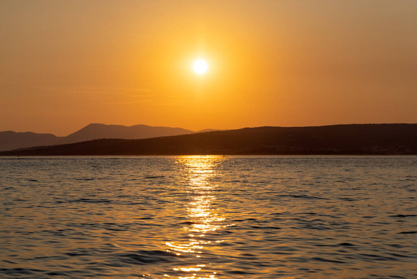Sunset on the Adriatic Sea near Krk ISland, Croatia - Fotoğraf, Görsel