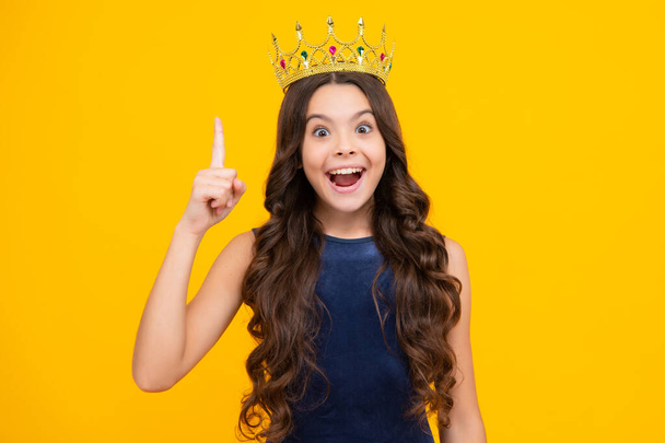 Beauty teen girl queen wear crown. Child in princess diadem. Happy girl face, positive and smiling emotions - Фото, зображення