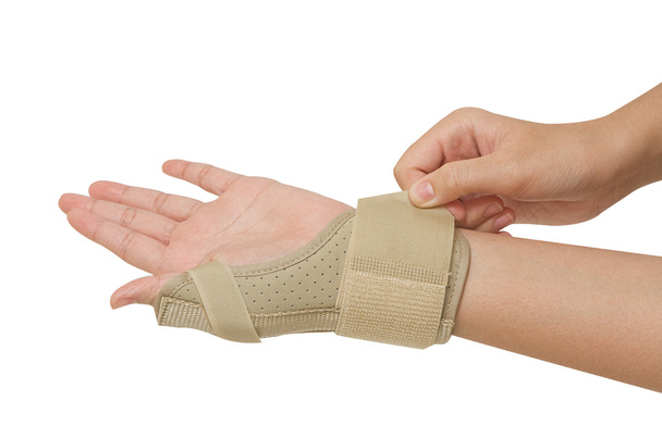 Lesão esportiva, pulso com suporte cinta dor liberação
 - Foto, Imagem