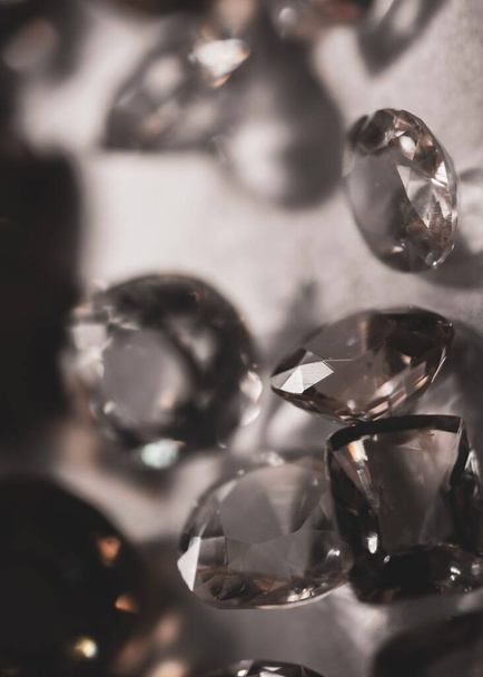 A vertical close-up of transparent shiny crystals - 写真・画像