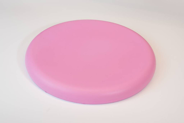 A Close up of colorful soft Frisbee disc - Fotó, kép