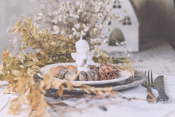 Christmas decoration table servise with almonds, cutlery and oth - Photo, Image