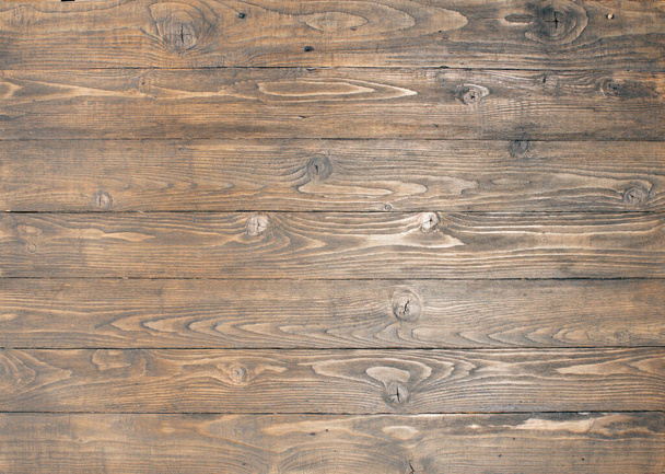 background of textured teak-coloured rough-finished pine planks. - Zdjęcie, obraz