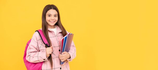 Autumn fall school. cheerful student hold notebooks and books. back to school. Banner of school girl student. Schoolgirl pupil portrait with copy space - Foto, Imagem