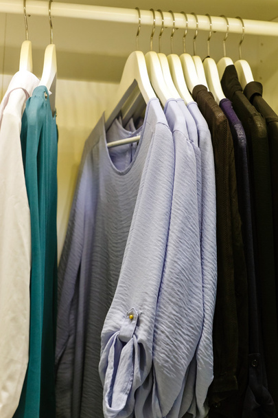 Clothing on hangers - Foto, Imagen