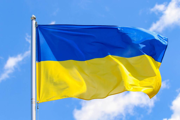 The Flag of Ukraine consists of equally sized horizontal bands of blue and yellow. - Fotoğraf, Görsel