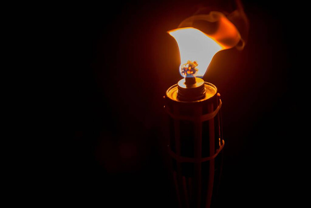 A closeup shot of a burning torch - Φωτογραφία, εικόνα