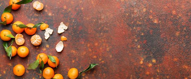 Sweet tangerines on grunge background with space for text - Фото, зображення