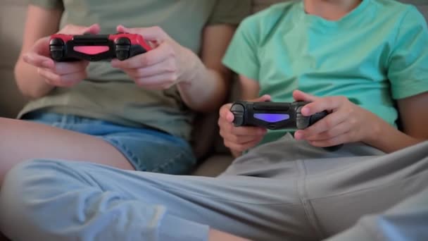 Son and mother playing video game at home, Family spending time together, Happy relationship, Online entertainment and leisure activity, - Footage, Video
